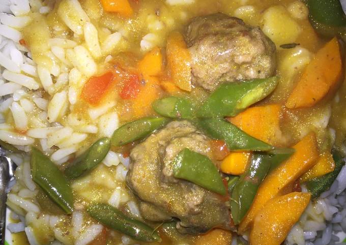 A picture of Vegetable meatball soup.