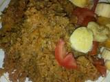 A picture of Pilau with tomatoes and bananas.