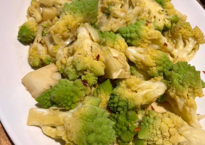 A picture of Blanched then sautéed romanesco broccoli in garlic, butter & soy sauce.