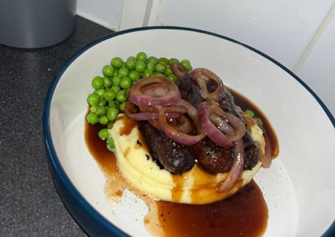 A picture of Sausage and mash.