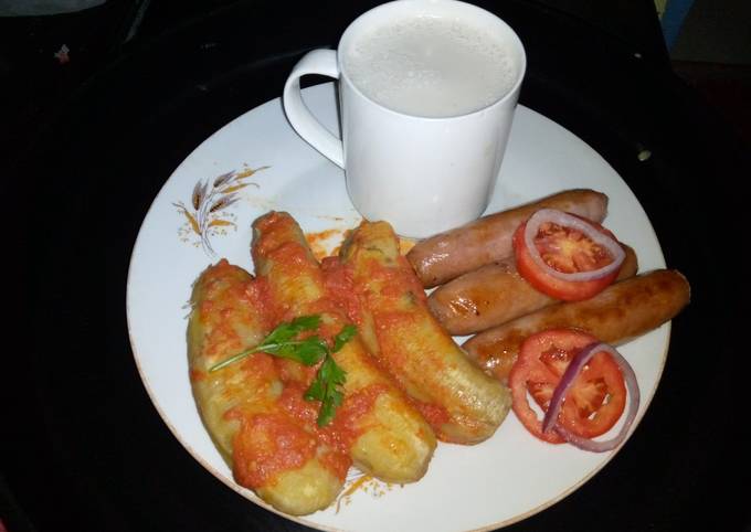 A picture of Boiled bananas in tomatoes.