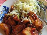 A picture of Masala potatoes and streamed cabbage.