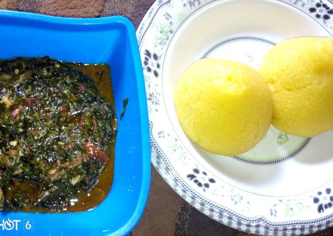 A picture of Eba with vegetable soup.