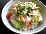 A picture of Smoked Salmon & Avocado Salad Sushi Rice Bowl.