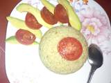 A picture of My special egg rice with ovacado and tomatoes.