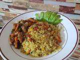 A picture of Vegetable rice and beef stew.