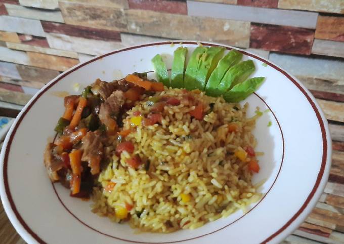 A picture of Vegetable rice and beef stew.