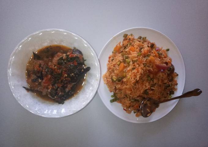 A picture of Vegetable jallof rice with catfish peppersoup.