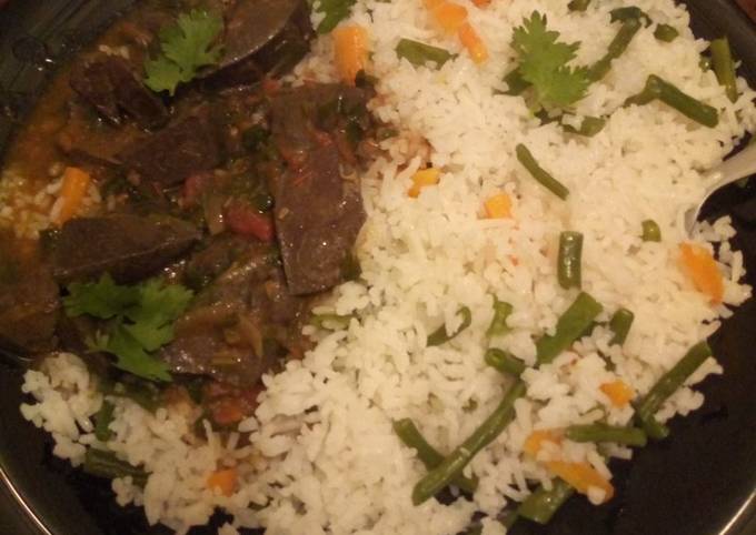 A picture of Vegetable rice with liver #weeklyjikonichallenge#.