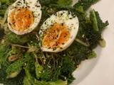 A picture of Savoy cabbage with soft boiled eggs and furikake.