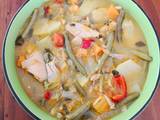 A picture of Chicken soup with Squash, French Beans & Tomato.