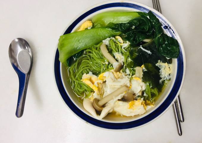 A picture of Spinach noodle vegetable miso soup.