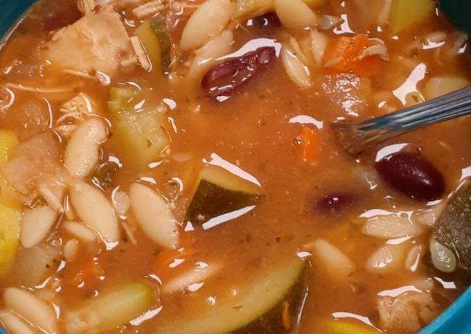 A picture of *Tomato Chicken Zucchini Orzo Soup.