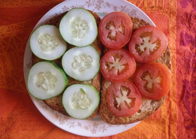 A picture of Cucumber, Tomato sandwich.