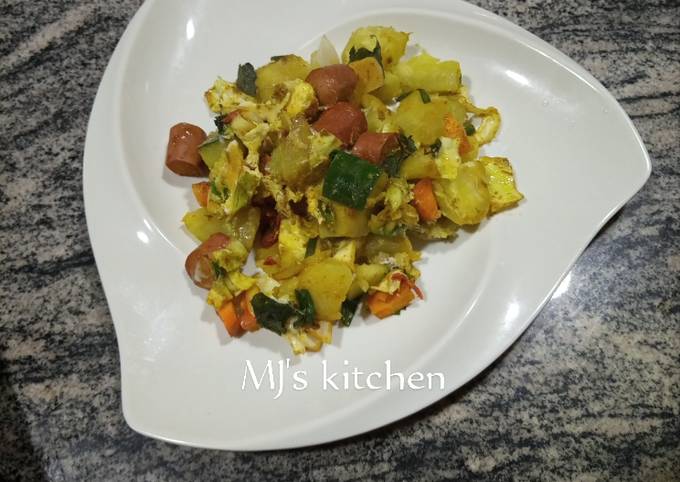 A picture of Baked sweet potatoes in vegetable mix.