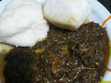 A picture of Tuwo shinkafa n vegetable soup.