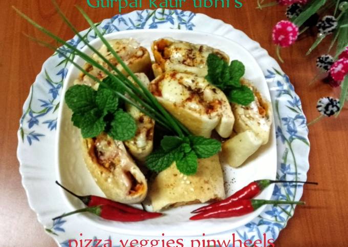 A picture of Pizza veggies pinwheels.