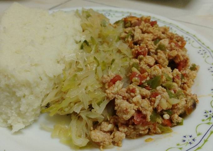 A picture of Ugali, streamed cabbage and fried eggs.#festival contest#Mombasa.