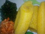 A picture of Plantain with egg sauce n vegetables.