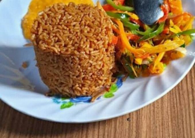 A picture of Beef pilau&stir fried Veggies #foodphotography.