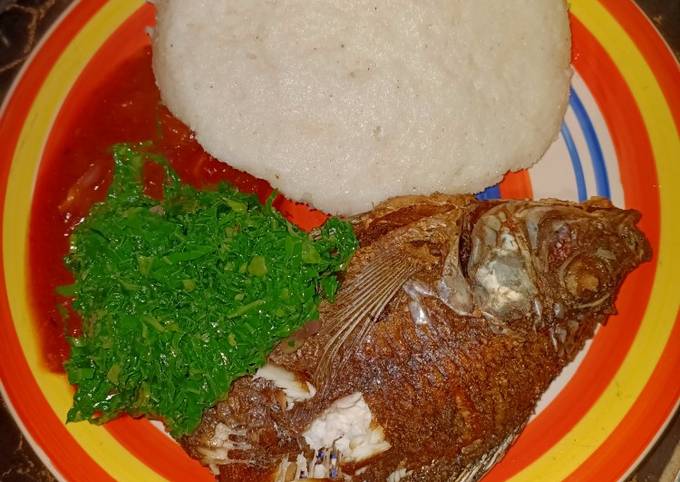 A picture of Fried Fish sukuma ugali.