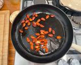 A picture of step 2 of Pan fried kale with toasted almonds.