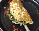 A picture of step 8 of Spinach Tomato & Feta Omelette.