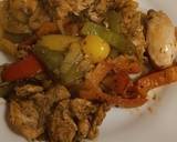 A picture of step 5 of Tandoori marinated chicken thighs with mixed peppers and onion.