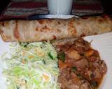 A picture of step 10 of Chapati served with beef and steamed cabbage.