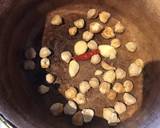 A picture of step 2 of California Farm Candle Nuts Chicken Soup.