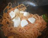 A picture of step 4 of Simple tomato pasta with mozzarella and padron peppers.