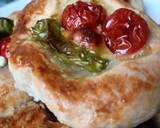 A picture of step 7 of Feta tomatoes pastry in the oven in 10 minutes.