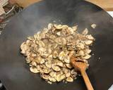 A picture of step 2 of Creamy mushroom risotto.