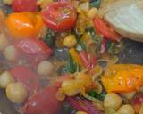 A picture of step 5 of One-pan egg, tomato, chard + cumin brunch.