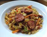 A picture of step 3 of Sautéed cabbage and carrot with sausage.