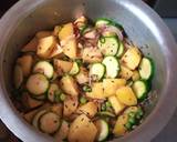 A picture of step 3 of Potato, cabbage, peas curry.