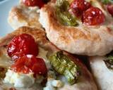 A picture of step 7 of Feta tomatoes pastry in the oven in 10 minutes.