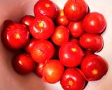 A picture of step 2 of Heirloom tomatoes marinated.