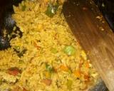 A picture of step 10 of Spicy vegetable rice with egg and sausage.