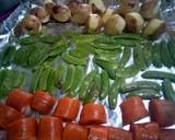 A picture of step 3 of Ginger, garlic and rosemary vegetables.