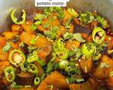 A picture of step 4 of Aubergine and potato curry:
(Aloo Baingan).