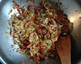 A picture of step 2 of Sautéed cabbage and carrot with sausage.