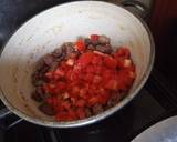 A picture of step 4 of Wet Fried Gizzards and traditional vegetables.