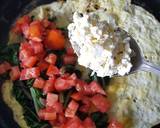 A picture of step 7 of Spinach Tomato & Feta Omelette.