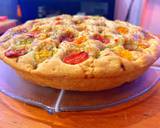 A picture of step 8 of Foccacia with cherry tomatoes, rosemary and pomegranate molasses.