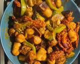 A picture of step 9 of Chicken sausage vegetable tray bake with red pesto.