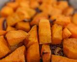 A picture of step 1 of Buttery Salmon with Sweet Potatoes and Carrots.