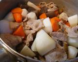 A picture of step 2 of Filling Tonjiru (miso soup with pork and vegetables).