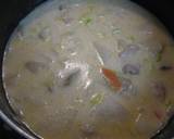 A picture of step 6 of Hearty and Creamy Tonjiru (miso soup with pork, vegetables and a dash of milk).