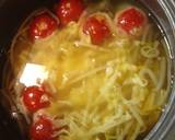 A picture of step 4 of A Nice Tomato and Vegetable Egg Soup.